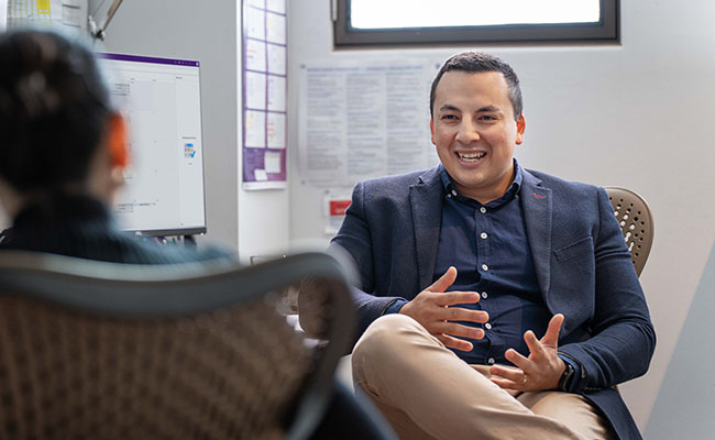 UQ Law student support and wellness officer Dony in his office. 