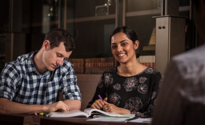 Students studying in law library