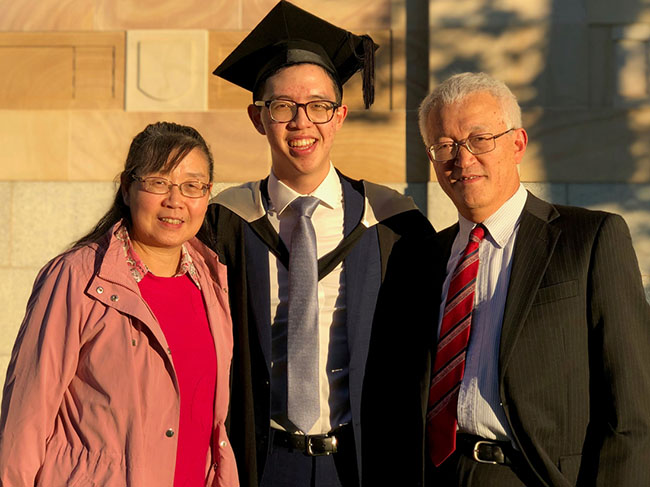 Michael with his parents.