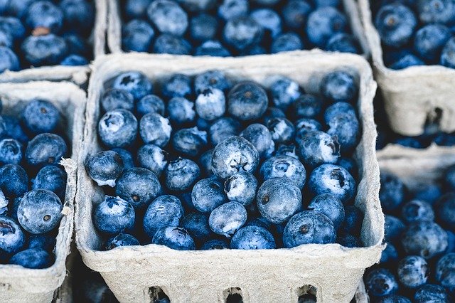 This is an image of several cartons of blueberries