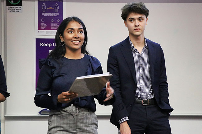 students presenting during the KWM Prize