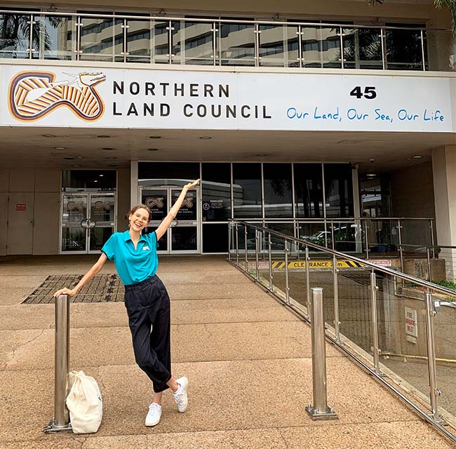 Anna out the front of her Aurora Internship Program placement, the Northern Land Council (NLC) in Darwin.