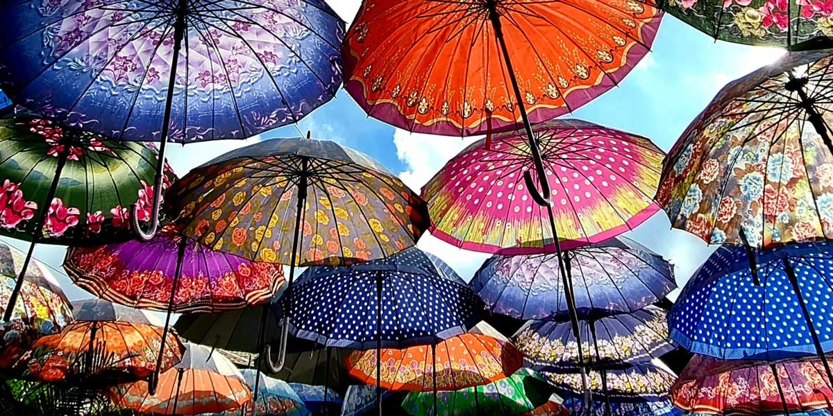coloured umbrellas forming a roof 