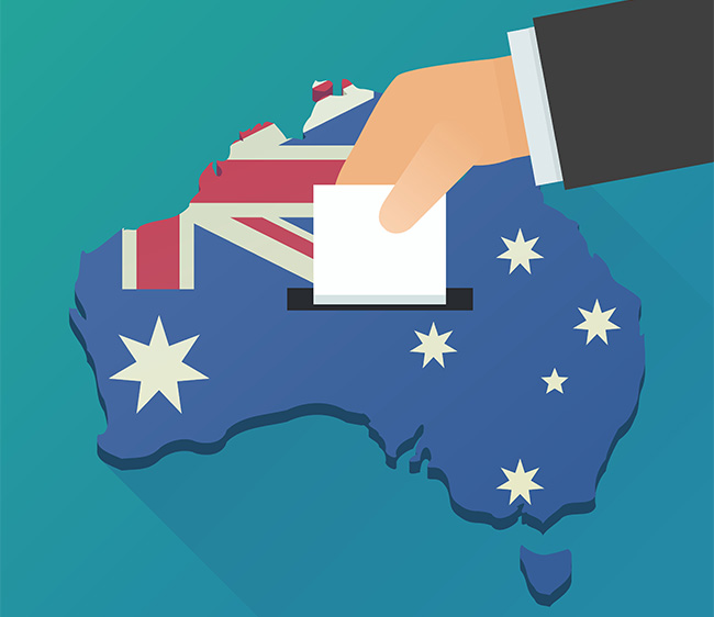 vector art of hand placing ballot paper into a slot in Australia.