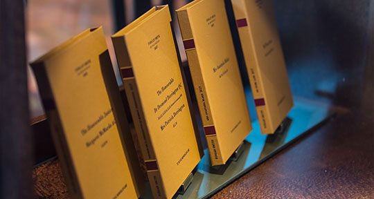 UQ law publications behind display glass