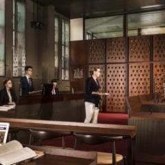 A group of students in a court room.