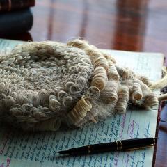 barrister's wig on notebook