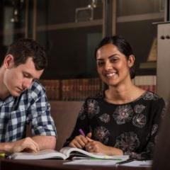 Students studying in law library
