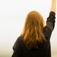 Person with hand raised