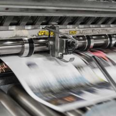 Printing press printing newspaper