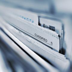 newspaper with classified section