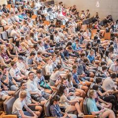 a packed lecture theatre full of students at UQ.