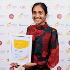 Famin Ahmed holding Queensland Community Foundation 2023 award 