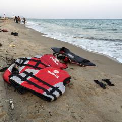 life jackets washed up on the beach