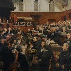Scene from the Tichborn criminal trial (Regina v. Castro), which took place in 1873–74 at the Court of Queen's Bench, London. The Claimant (probably named Arthur Orton) is the bearded man in the lower centre of the picture, facing left; he is sitting in front of his lawyer, Edward Kenealy, who is leaning against the desk.
