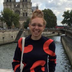 Amy Bergman in front of the Notre Dame in Paris
